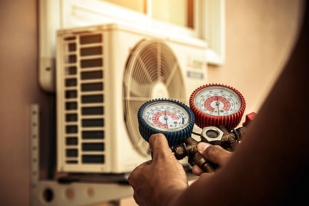 Professional Air Conditioning Service technician working in Saginaw, MN